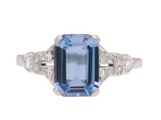 Aquamarine and diamond flank solitaire ring, circa 1940. Hatton Garden