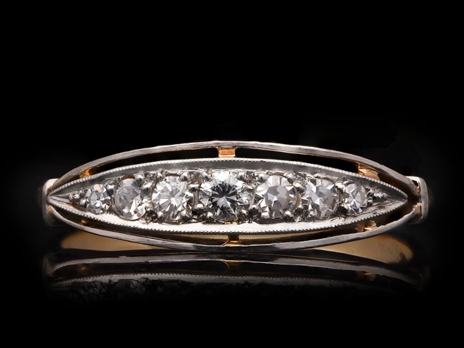 Seven stone diamond ring, French, circa 1915. Hatton Garden