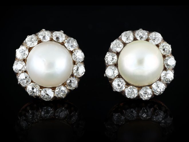 Victorian natural pearl and diamond cluster earrings, circa 1880.