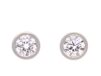 Convertible diamond stud earrings, circa 1970. Hatton Garden