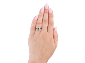Colombian emerald and diamond coronet cluster ring, circa 1915. Hatton Garden