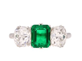 Colombian emerald and diamond three stone ring, circa 1920. Hatton Garden