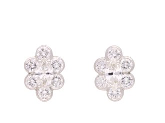 Vintage diamond cluster diamond earrings, circa 1970. Hatton Garden