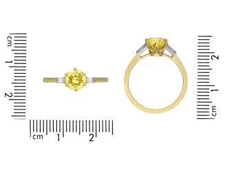 fancy yellow diamond flank solitaire ring. hatton garden.