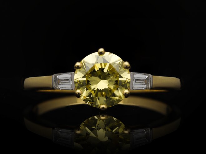 fancy yellow diamond flank solitaire ring. hatton garden.