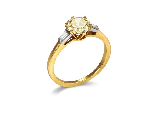 Fancy Intense yellow diamond flank solitaire ring, circa 1950. 
