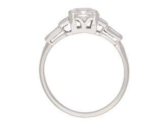 Emerald cut diamond flanked solitaire ring hatton garden