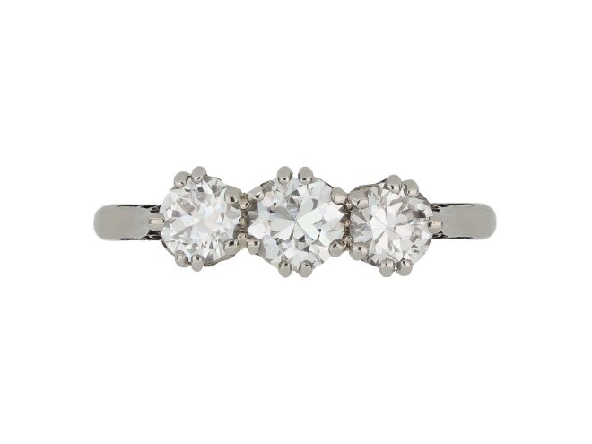 Old cut diamond three stone ring, circa 1910. 