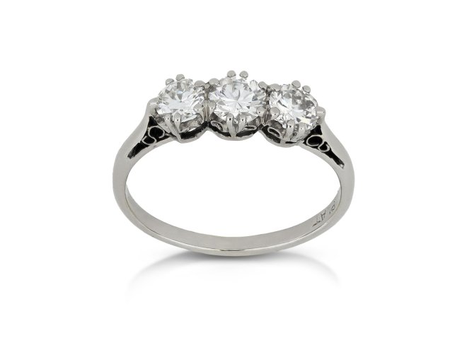 Old cut diamond three stone ring, circa 1910. 