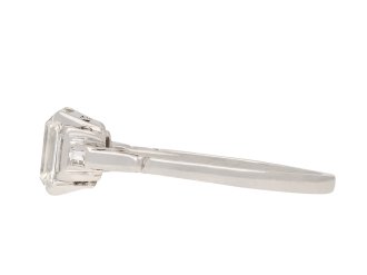 Art Deco diamond flanked solitaire ring, circa 1920. Hatton Garden