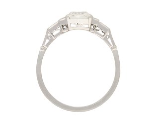 Art Deco diamond flanked solitaire ring, circa 1920. Hatton Garden