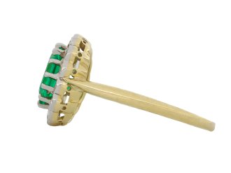 Colombian emerald and diamond coronet cluster ring, circa 1915.