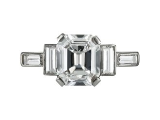 Art Deco diamond flanked solitaire ring, circa 1930.