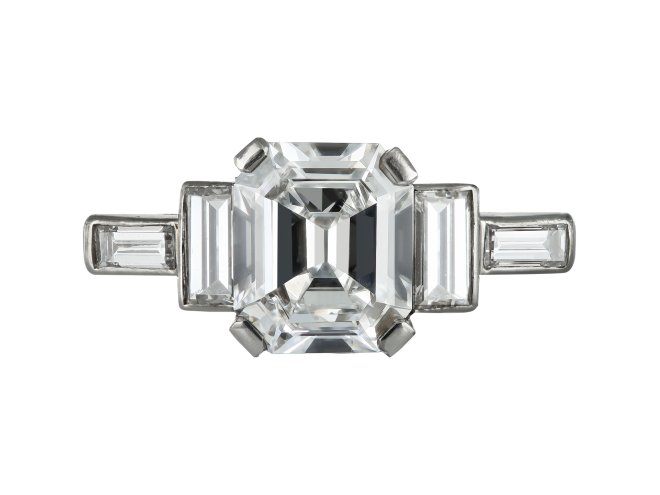 Art Deco diamond flanked solitaire ring, circa 1930.