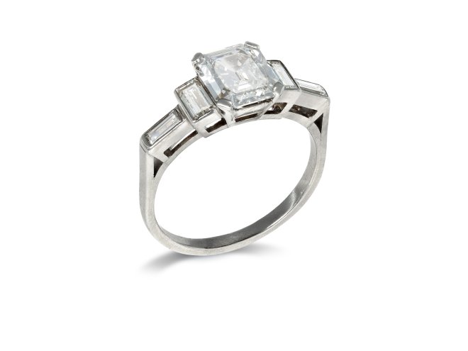 Art Deco diamond flanked solitaire ring, circa 1930.