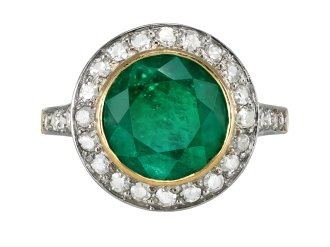 Colombian Emerald and diamond target ring, circa 1915.