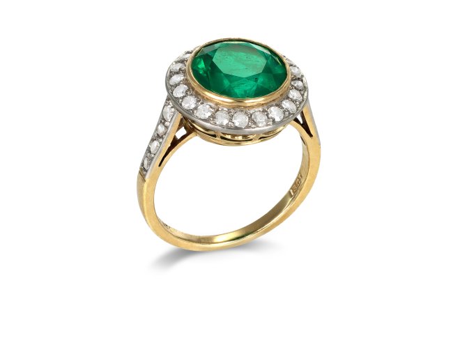 Colombian Emerald and diamond target ring, circa 1915.