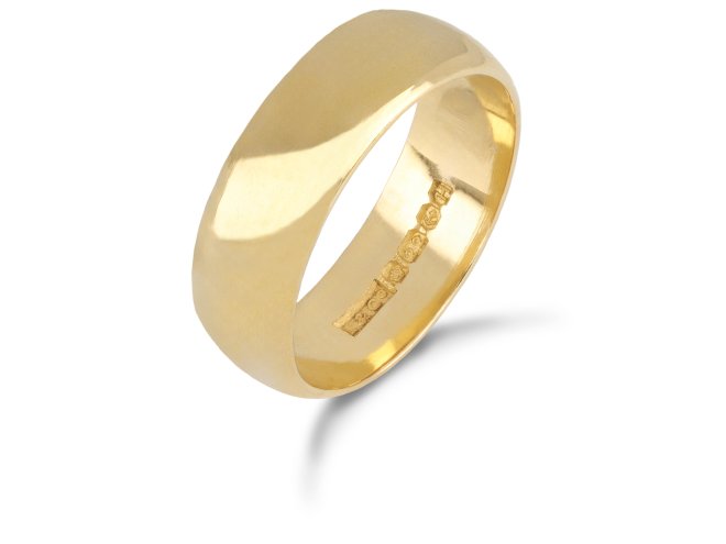 Yellow gold wedding band, English, 1957.