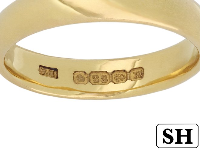 Yellow gold wedding band, English, 1909.