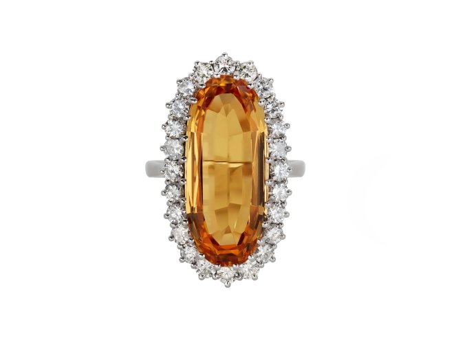 Yellow topaz diamond cluster ring, English, 1983. hatton garden