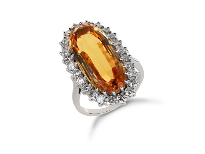 Yellow topaz diamond cluster ring, English, 1983. hatton garden
