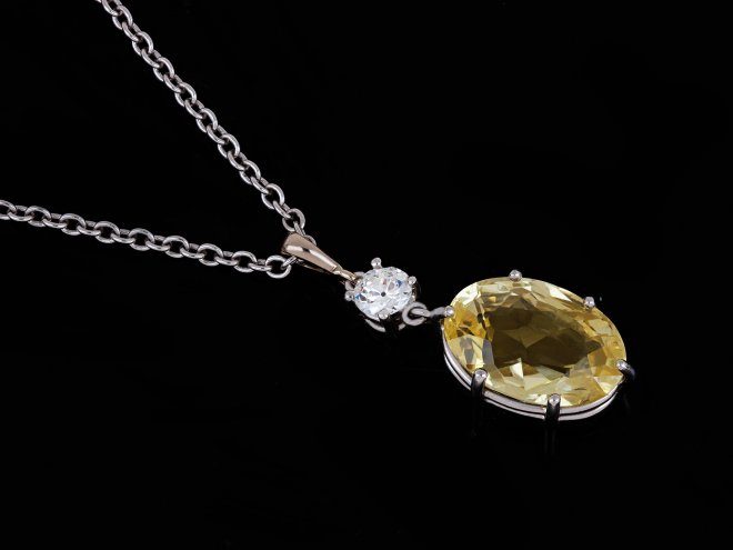 Yellow Ceylon sapphire and diamond pendant,hatton garden