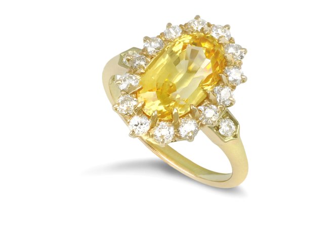 Yellow Ceylon sapphire and diamond coronet cluster ring, circa 1900.