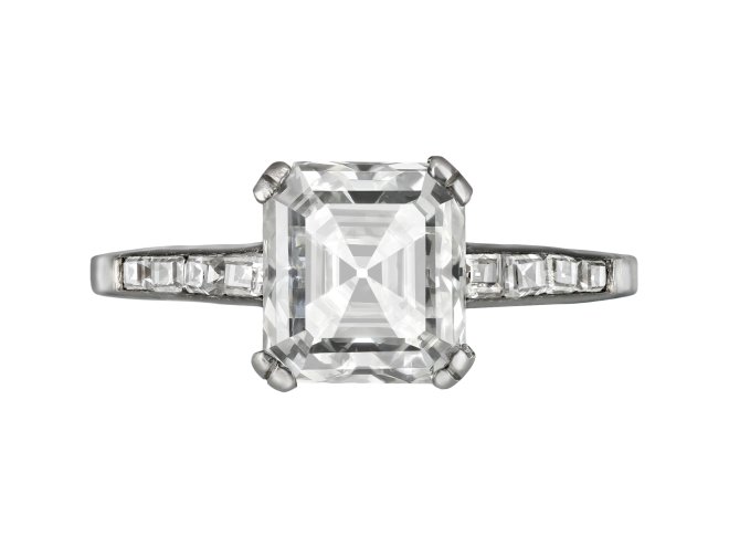 Asscher cut diamond flanked solitaire ring, circa 1930. 