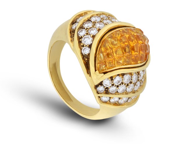 Kutchinsky yellow sapphire and diamond dress ring, circa 1980.