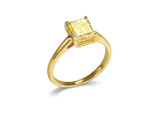 Fancy Intense Yellow diamond solitaire ring.
