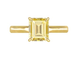 Fancy Intense Yellow diamond solitaire ring.