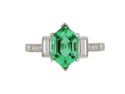 Emerald and diamond flanked solitaire ring, circa 1990