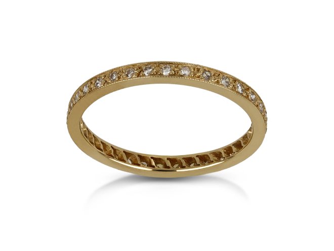 Diamond full eternity ring, circa 1950.