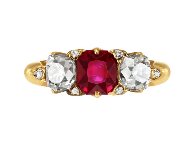 Victorian ruby and diamond carved ring, circa 1890.