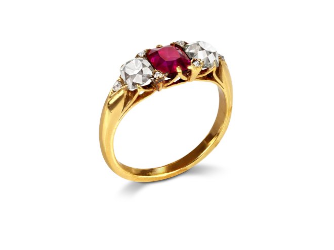 Victorian ruby and diamond carved ring, circa 1890.