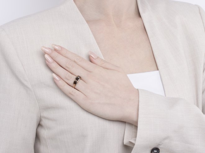 Brown diamond three stone ring.