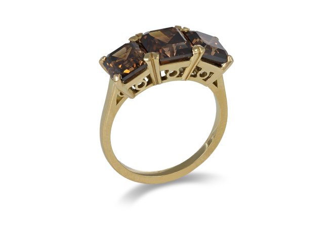 Brown diamond three stone ring.