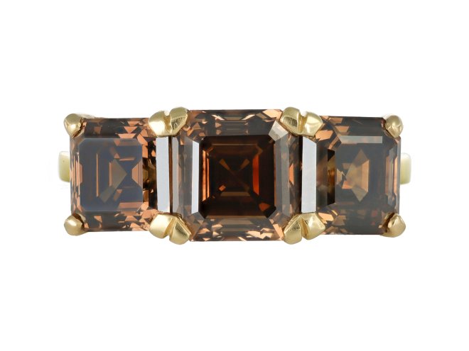 Brown diamond three stone ring.
