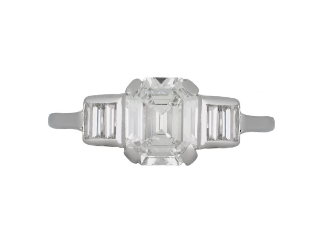 Art Deco diamond flanked solitaire ring, circa 1920.