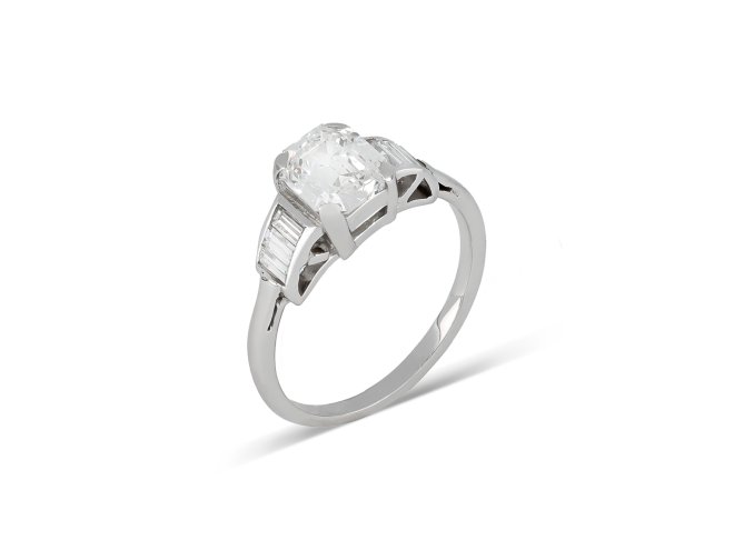 Art Deco diamond flanked solitaire ring, circa 1920.