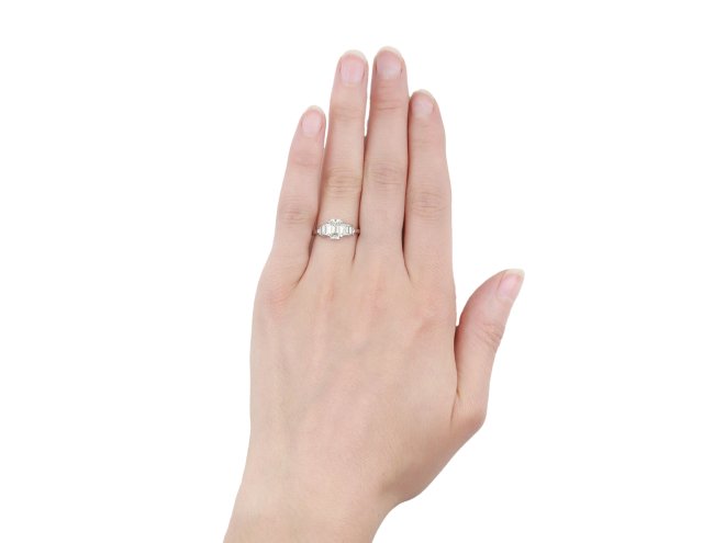 Art Deco diamond flanked solitaire ring, circa 1920.