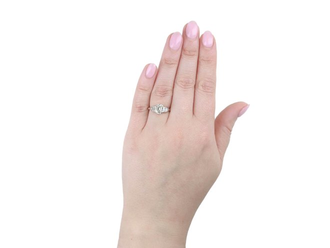 Art Deco diamond flanked solitaire ring, circa 1920.