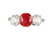 Burmese ruby and diamond three stone ring, circa 1940.