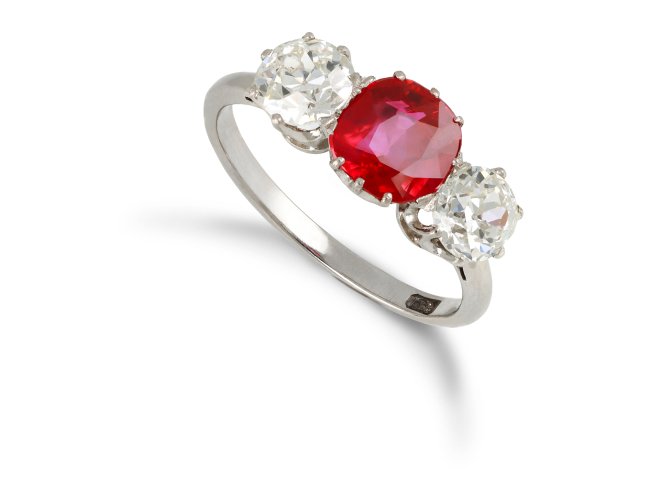 Burmese ruby and diamond three stone ring, circa 1940.