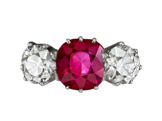 Burmese ruby and diamond three stone ring, early 20th Century. 