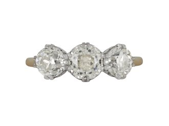 Old cut diamond three stone ring, circa 1905. 