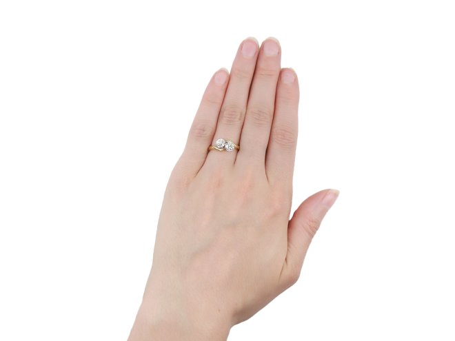 Edwardian diamond crossover ring, circa 1910. 
