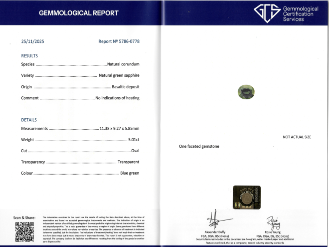 5.01 carat green sapphire and diamond flanked solitaire ring. 