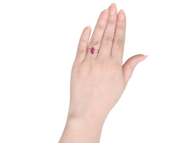 Burmese ruby and diamond flanked solitaire ring, circa 1915. 