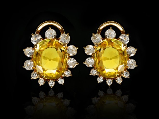 Yellow Ceylon sapphire and diamond cluster earrings, circa 1960.